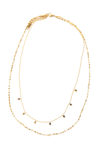 Our Caines Double Layer Necklace is a timeless piece that can be worn as a layering piece or on her own.