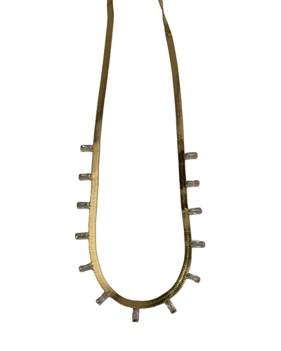 The Lottie Necklace features thirteen cubic zirconia baguette stones for a timeless look. 