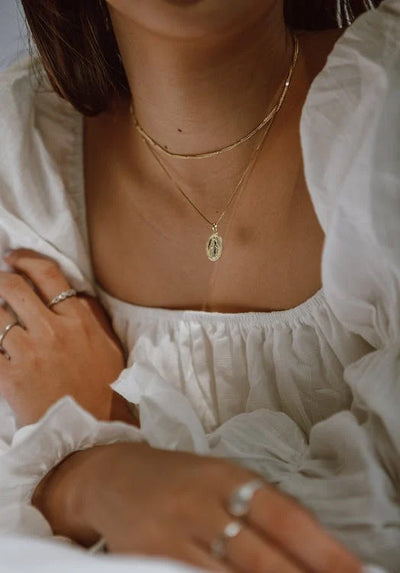How to Layer Initial Necklaces for a Chic Look